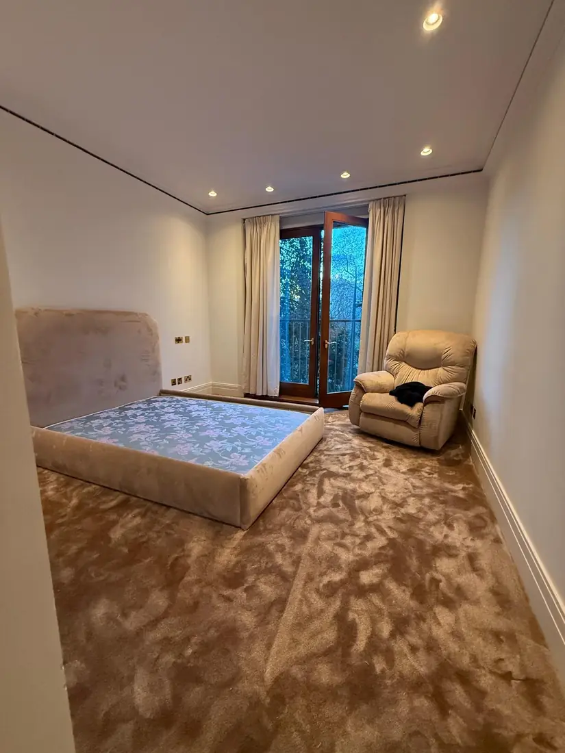 Soft plush carpet fitted in a large bedroom