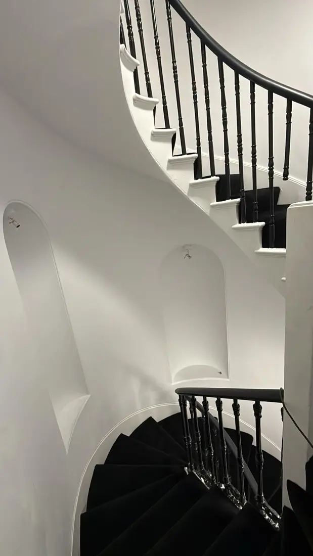 Black carpet on a spiral staircase