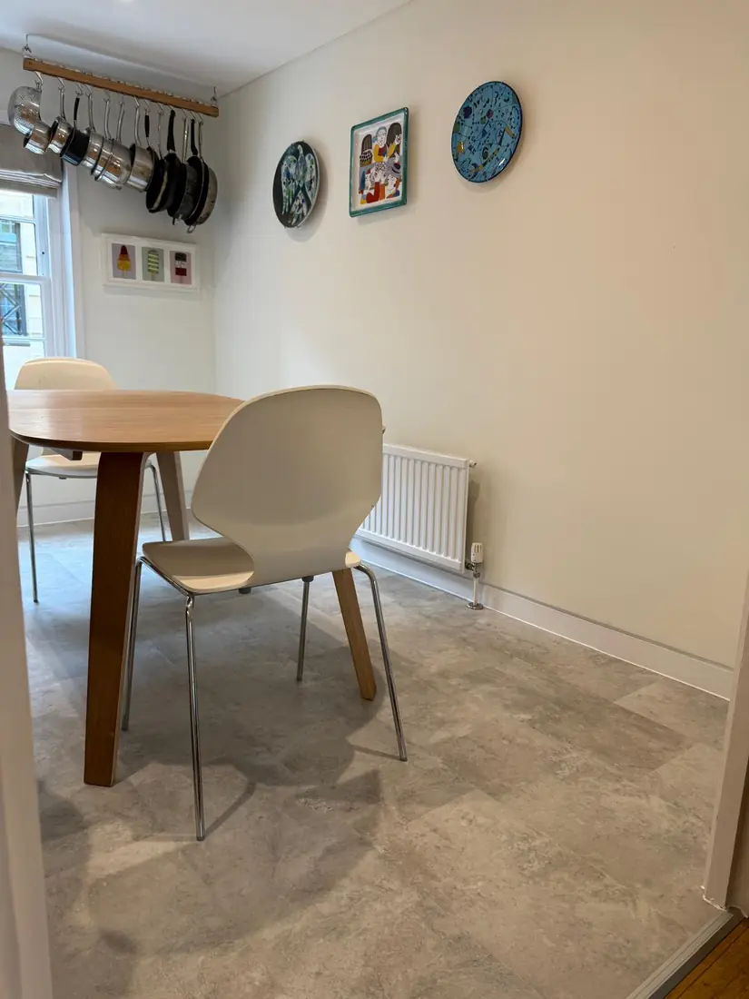 Grey stone-effect vinyl in a dining area